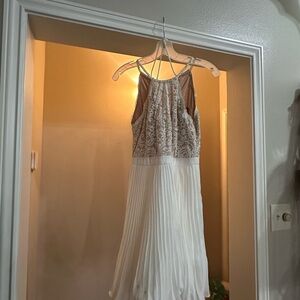 Elegant White Lace and Pleated Dress